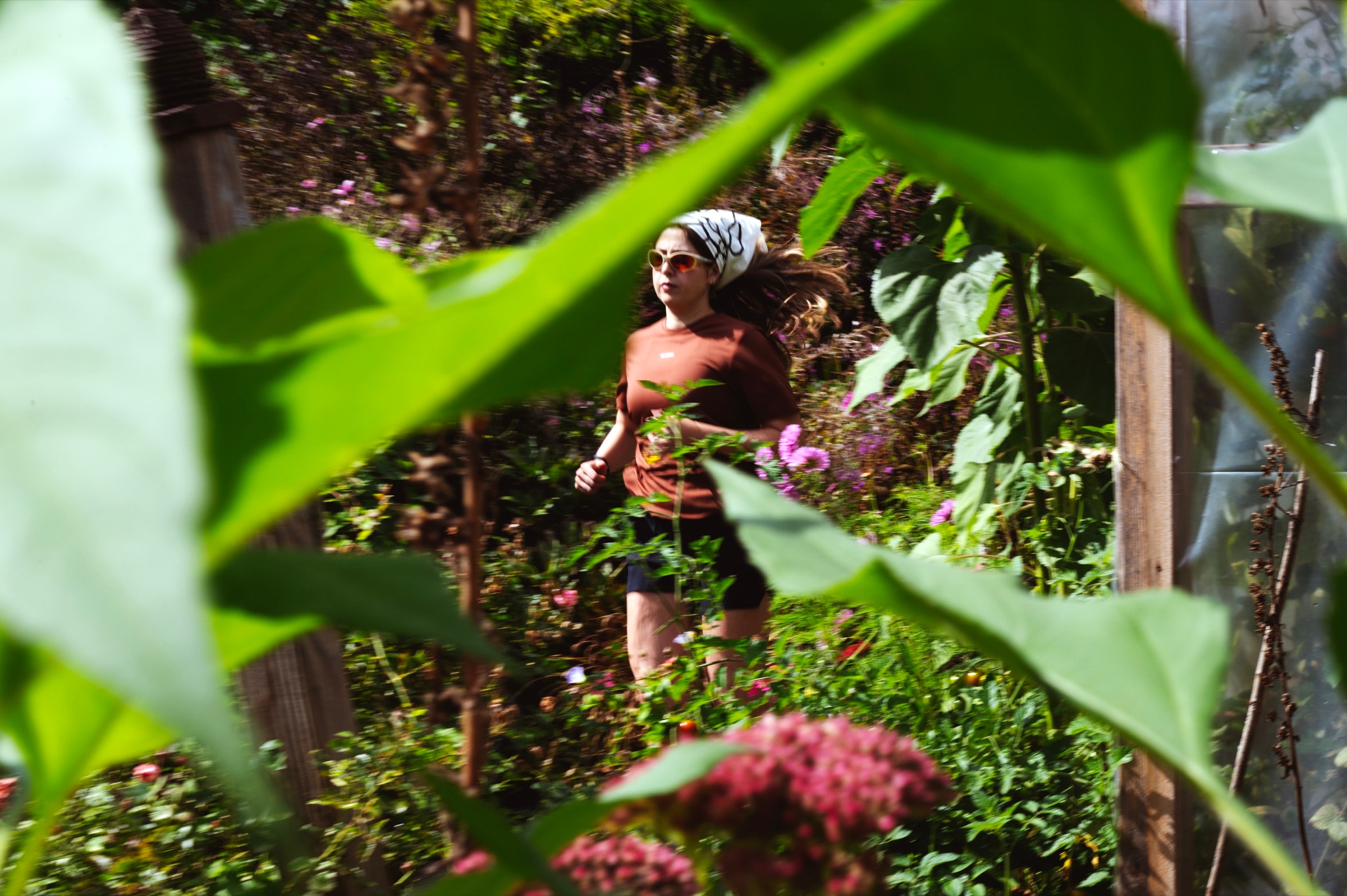 Salomon In Bloom lookbook, floral installation with runners